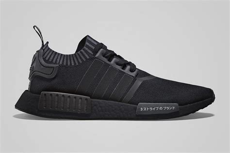 nmd r1 all black.